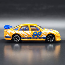 Load image into Gallery viewer, Matchbox 1998 Holden Commodore Orange #64 Matchbox 1-75 Series
