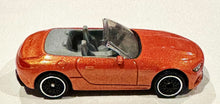 Load image into Gallery viewer, Matchbox 2025 Mercedes-AMG SL 63 Orange #26 MBX Road Trip New Sealed Box