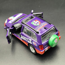 Load image into Gallery viewer, Official AFL 2013 Fremantle Dockers Toyota RAV4 Purple AFL Collectable Model Car 1:43 Diecast