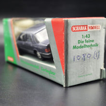 Load image into Gallery viewer, Schabak Modell 1987 Ford Sierra 2.0i Ghia Blue/Grey #1080 1:43 Die Cast Model