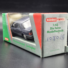Load image into Gallery viewer, Schabak Modell 1987 Ford Sierra 2.0i Ghia Blue/Grey #1080 1:43 Die Cast Model