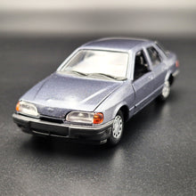 Load image into Gallery viewer, Schabak Modell 1987 Ford Sierra 2.0i Ghia Blue/Grey #1080 1:43 Die Cast Model