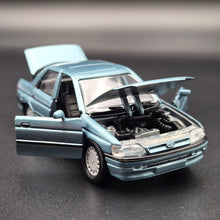 Load image into Gallery viewer, Schabak Modell 1993 Ford Orion (Escort) Light Blue #1092 1-43 Die Cast Model