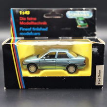Load image into Gallery viewer, Schabak Modell 1993 Ford Orion (Escort) Light Blue #1092 1-43 Die Cast Model