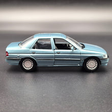 Load image into Gallery viewer, Schabak Modell 1993 Ford Orion (Escort) Light Blue #1092 1-43 Die Cast Model