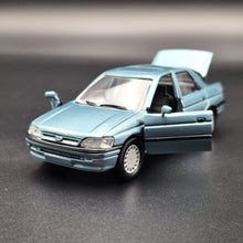 Load image into Gallery viewer, Schabak Modell 1993 Ford Orion (Escort) Light Blue #1092 1-43 Die Cast Model