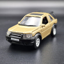 Load image into Gallery viewer, Smart Toys 2003 Land Rover Freelander Gold 1:52 Diecast Car
