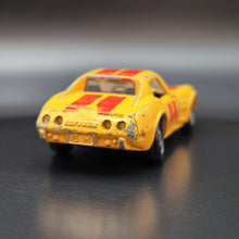 Load image into Gallery viewer, Tomica 1977 Chevrolet Corvette Stingray Dark Yellow #F21