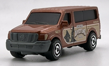 Load image into Gallery viewer, Matchbox 2022 Nissan NV Van Brown #1 MBX Showroom New Long Card