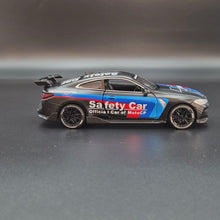 Load and play video in Gallery viewer, Explorafind 2022 BMW M4 Coupe Safety Car Satin Black 1:32 Die Cast Car