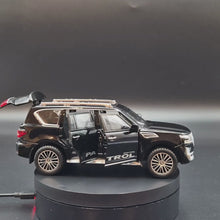 Load and play video in Gallery viewer, Explorafind 2023 Nissan Patrol Black 1:32 Die Cast Car