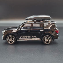 Load and play video in Gallery viewer, Explorafind 2023 Nissan Patrol Black 1:32 Die Cast Car
