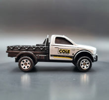 Load image into Gallery viewer, Matchbox 2019 2016 RAM Flatbed Silver #24 MBX Construction 1/20