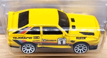 Load image into Gallery viewer, Hot Wheels 2022 '84 Audi Sport Quattro Yellow #180 Rally Champs 1/5 New Long Card