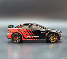 Load image into Gallery viewer, Hot Wheels 2020 2008 Lancer Evolution Black #69 HW Speed Graphics 1/10