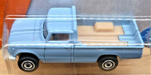 Load image into Gallery viewer, Matchbox 2017 '62 Nissan Junior Light Blue #7 MBX Adventure City New Long Card