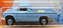 Load image into Gallery viewer, Matchbox 2017 '62 Nissan Junior Light Blue #7 MBX Adventure City New Long Card