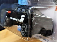 Load image into Gallery viewer, Hot Wheels 2020 '19 Chevy Silverado Trail Boss LT Black #151 HW Hot Trucks 5/10