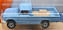 Load image into Gallery viewer, Matchbox 2017 '62 Nissan Junior Light Blue #7 MBX Adventure City New Long Card