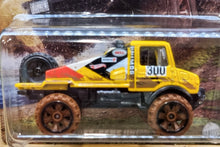 Load image into Gallery viewer, Hot Wheels 2022 Mercedes Benz Unimog 1300 Yellow Mud Runners 1/5 New Long Card
