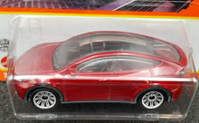 Load image into Gallery viewer, Matchbox 2022 Tesla Model Y Red #18 MBX Metro New Long Card
