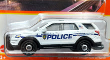 Load image into Gallery viewer, Matchbox 2022 2016 Ford Interceptor Utility White MBX Metro #92/100 New Long Card
