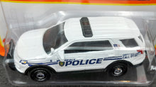 Load image into Gallery viewer, Matchbox 2022 2016 Ford Interceptor Utility White MBX Metro #92/100 New Long Card
