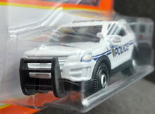 Load image into Gallery viewer, Matchbox 2022 2016 Ford Interceptor Utility White MBX Metro #92/100 New Long Card
