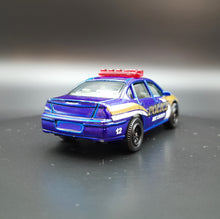 Load image into Gallery viewer, Matchbox 2010 2000 Chevrolet Impala Dark Blue #57 Emergency Response 7/8
