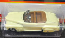 Load image into Gallery viewer, Matchbox 2021 1941 Cadillac Series 62 Convertible Coupe Pale Yellow #34 MBX Showroom
