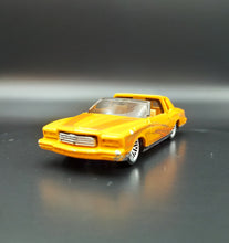 Load image into Gallery viewer, Hot Wheels 2001 Montezooma Dark Yellow #23/36 First Editions

