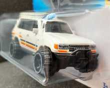 Load image into Gallery viewer, Hot Wheels 2023 Toyota Land Cruiser 80 Ivory #204 Then and Now 3/10 New Long Card
