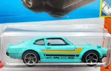 Load image into Gallery viewer, Hot Wheels 2023 Custom Ford Maverick Turquoise #99 Muscle Mania 2/10 New Long Card
