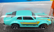 Load image into Gallery viewer, Hot Wheels 2023 Custom Ford Maverick Turquoise #99 Muscle Mania 2/10 New Long Card
