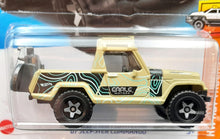 Load image into Gallery viewer, Hot Wheels 2023 &#39;67 Jeepster Commando Tan #94 HW Hot trucks 2/10 New Long Card
