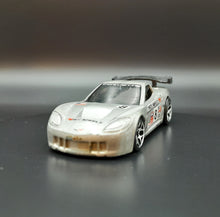 Load image into Gallery viewer, Hot Wheels 2006 Corvette C6R Pearl Silver #25 First Editions 25/38
