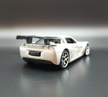 Load image into Gallery viewer, Hot Wheels 2006 Corvette C6R Pearl Silver #25 First Editions 25/38
