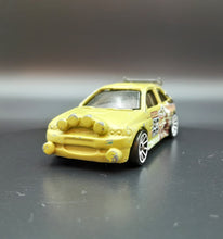 Load image into Gallery viewer, Hot Wheels 2009 Ford Escort Rally Khaki Trick Tracks 5 Pack Loose
