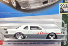 Load image into Gallery viewer, Hot Wheels 2023 Matt &amp; Debbie Hays 1988 Thunderbird White #56 Retro Racers New Long Card
