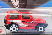 Load image into Gallery viewer, Hot Wheels 2023 Mitsubishi Pajero Evolution Red #175 Mud Studs 3/5 New Long Card
