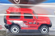 Load image into Gallery viewer, Hot Wheels 2023 Mitsubishi Pajero Evolution Red #175 Mud Studs 3/5 New Long Card
