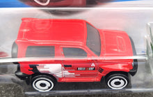 Load image into Gallery viewer, Hot Wheels 2023 Mitsubishi Pajero Evolution Red #175 Mud Studs 3/5 New Long Card
