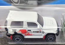 Load image into Gallery viewer, Hot Wheels 2023 Mitsubishi Pajero Evolution White #175 Mud Studs 3/5 New Long Card (Copy)
