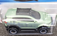 Load image into Gallery viewer, Hot Wheels 2023 Volvo XC40 Recharge Sage Green #201 Mud Studs 5/5 New Long Card
