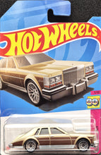 Load image into Gallery viewer, Hot Wheels 2023 &#39;82 Cadillac Seville Gold #75 HW: The &#39;80s 7/10 New Long Card
