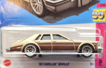 Load image into Gallery viewer, Hot Wheels 2023 &#39;82 Cadillac Seville Gold #75 HW: The &#39;80s 7/10 New Long Card
