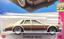 Load image into Gallery viewer, Hot Wheels 2023 &#39;82 Cadillac Seville Gold #75 HW: The &#39;80s 7/10 New Long Card
