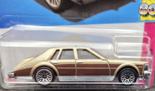 Load image into Gallery viewer, Hot Wheels 2023 &#39;82 Cadillac Seville Gold #75 HW: The &#39;80s 7/10 New Long Card
