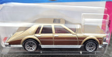 Load image into Gallery viewer, Hot Wheels 2023 &#39;82 Cadillac Seville Gold #75 HW: The &#39;80s 7/10 New Long Card
