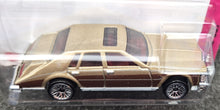 Load image into Gallery viewer, Hot Wheels 2023 &#39;82 Cadillac Seville Gold #75 HW: The &#39;80s 7/10 New Long Card
